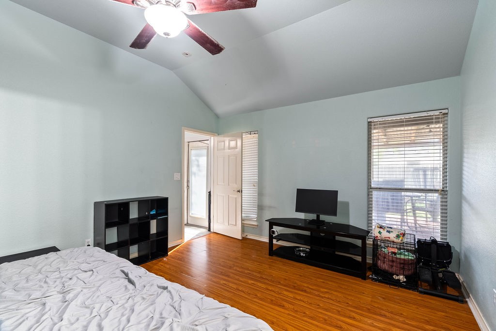 7510 Geiger Drive Corpus Christi, TX 78414 - Photo 11 of 15 a bedroom with a bed and a flat screen tv