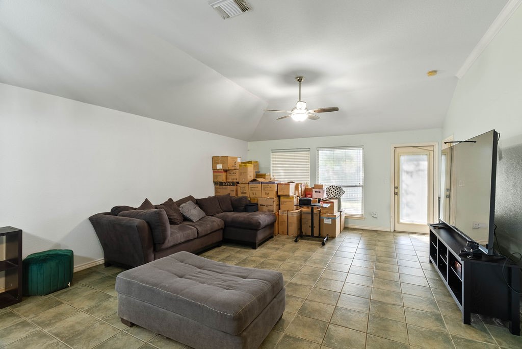 7510 Geiger Drive Corpus Christi, TX 78414 - Photo 5 of 15 a living room with furniture and a flat screen tv