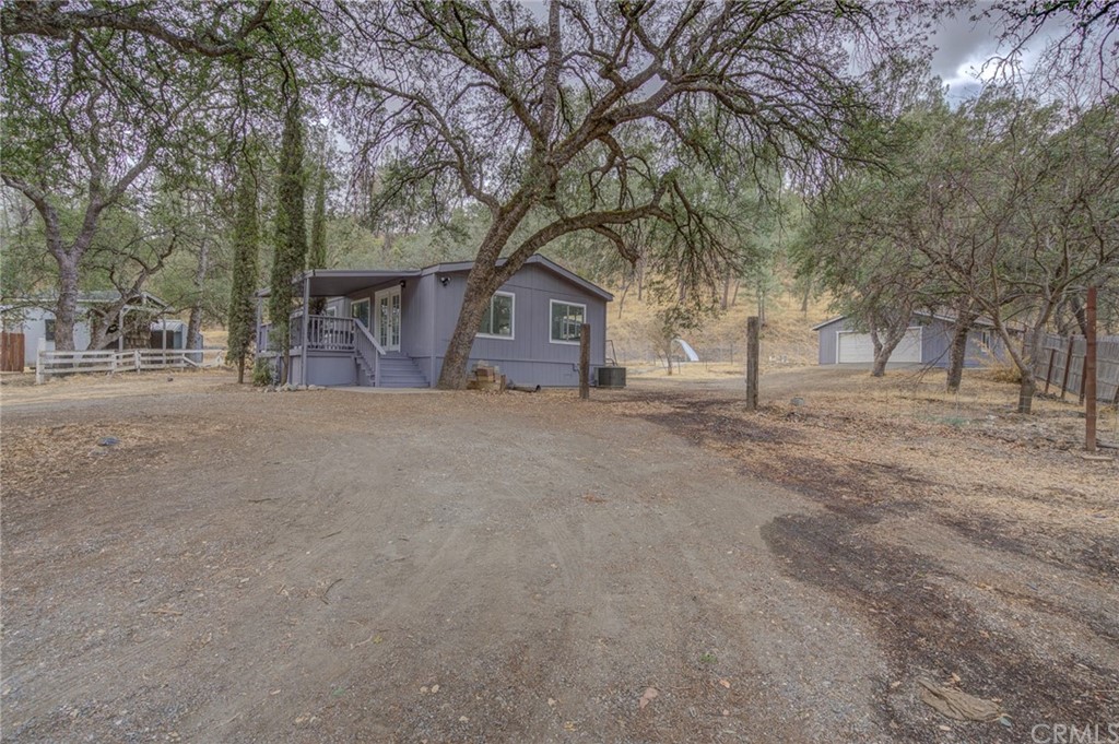 16557 Stagecoach Road Corning, CA 96021 - Photo 1 of 1 a view of large house with a outdoor space