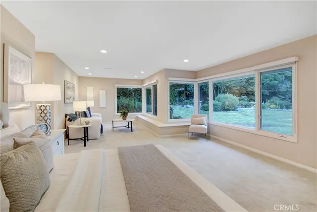 a bathroom with a tub and a shower