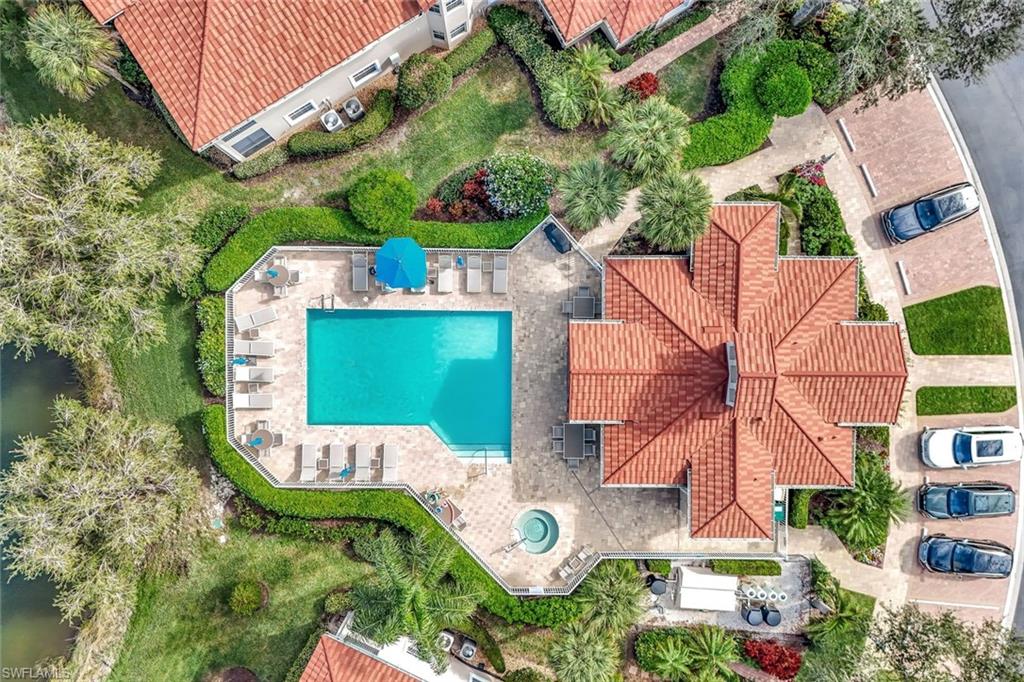 6200 Reserve Circle, Unit 404 Naples, FL 34119 - Photo 1 of 47 Bird's eye view of a Clubside Reserve and its pool and clubhouse.