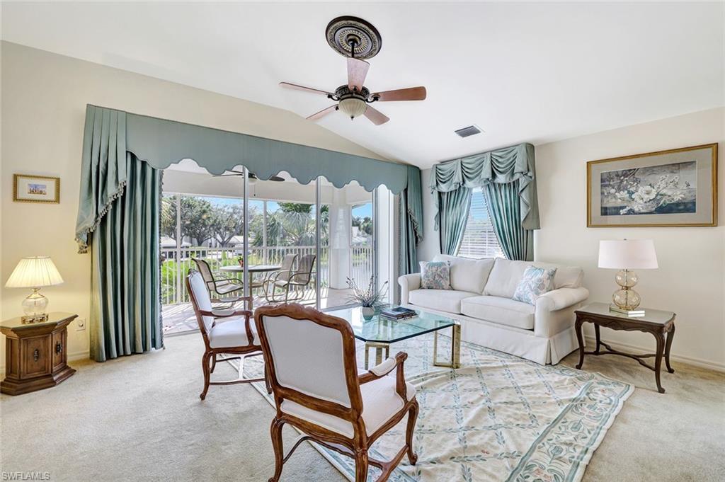 6200 Reserve Circle, Unit 404 Naples, FL 34119 - Photo 12 of 47 a living room with furniture