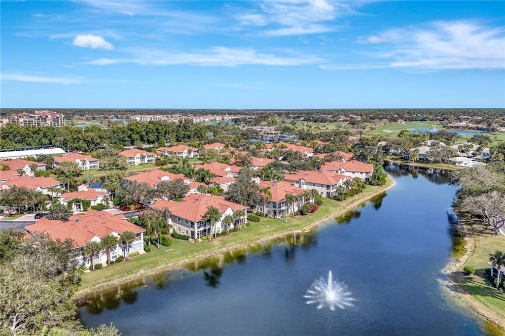 6200 Reserve Circle, Unit 404 Naples, FL 34119 - Photo 33 of 47 an aerial view of residential houses with outdoor space