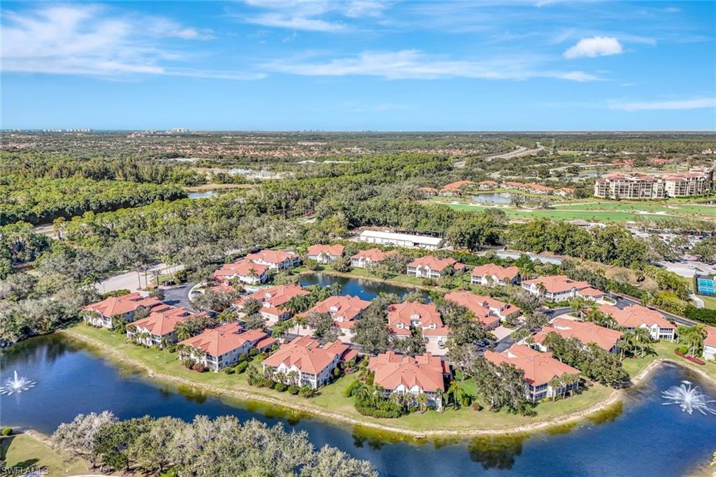 6200 Reserve Circle, Unit 404 Naples, FL 34119 - Photo 34 of 47 an aerial view of residential houses with outdoor space
