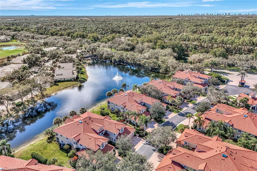 6200 Reserve Circle, Unit 404 Naples, FL 34119 - Photo 42 of 47 an aerial view of residential houses with outdoor space
