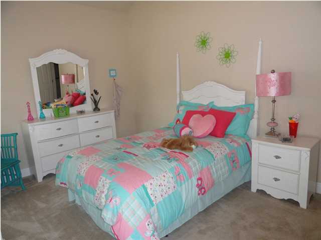 Lot 401 Pin Oak Loop Santa Rosa Beach, FL 32459 - Photo 2 of 13 a bedroom with a bed and a dresser