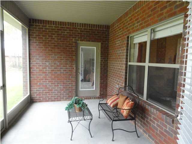 Lot 401 Pin Oak Loop Santa Rosa Beach, FL 32459 - Photo 10 of 13 a balcony with table and chairs