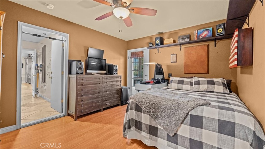 12920 Choco Road Apple Valley, CA 92308 - Photo 21 of 39 Separate-entry bedroom: Bedroom with private entrance and direct garage access—ideal for multigenerational living
