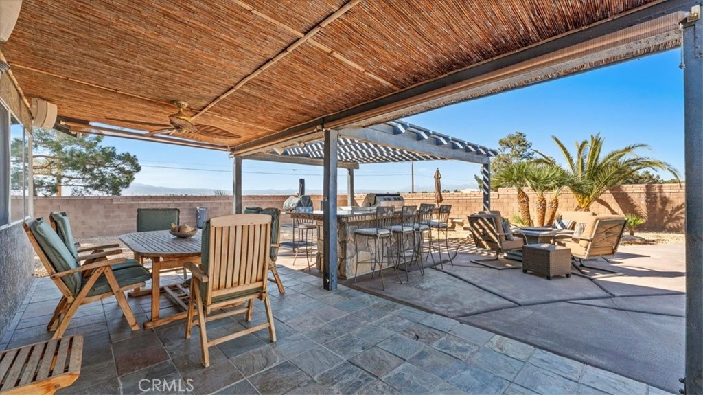 12920 Choco Road Apple Valley, CA 92308 - Photo 28 of 39 Main covered patio (slate tile):Main covered patio with slate tile flooring and multiple seating areas