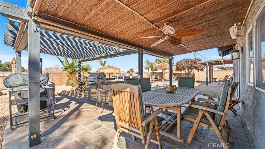 12920 Choco Road Apple Valley, CA 92308 - Photo 29 of 39 Another angle of main covered patio: Outdoor kitchen setup designed for entertaining and everyday use