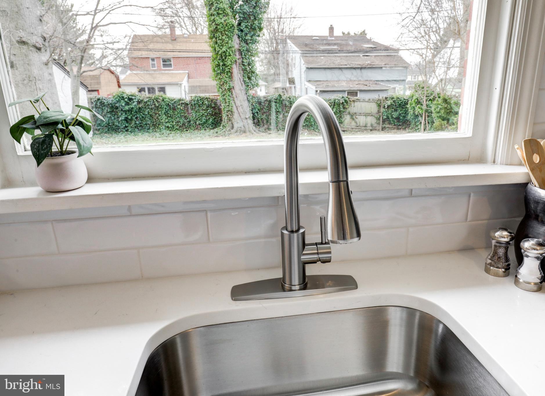 2316 Franklin Avenue Secane, PA 19018 - Photo 11 of 30 a bathroom with a sink and a window