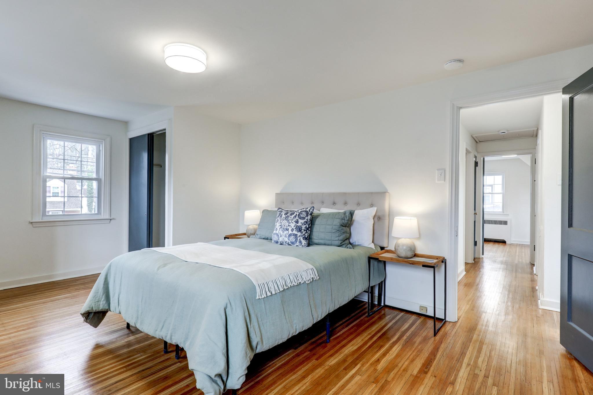 2316 Franklin Avenue Secane, PA 19018 - Photo 14 of 30 a bedroom with a bed and wooden floor