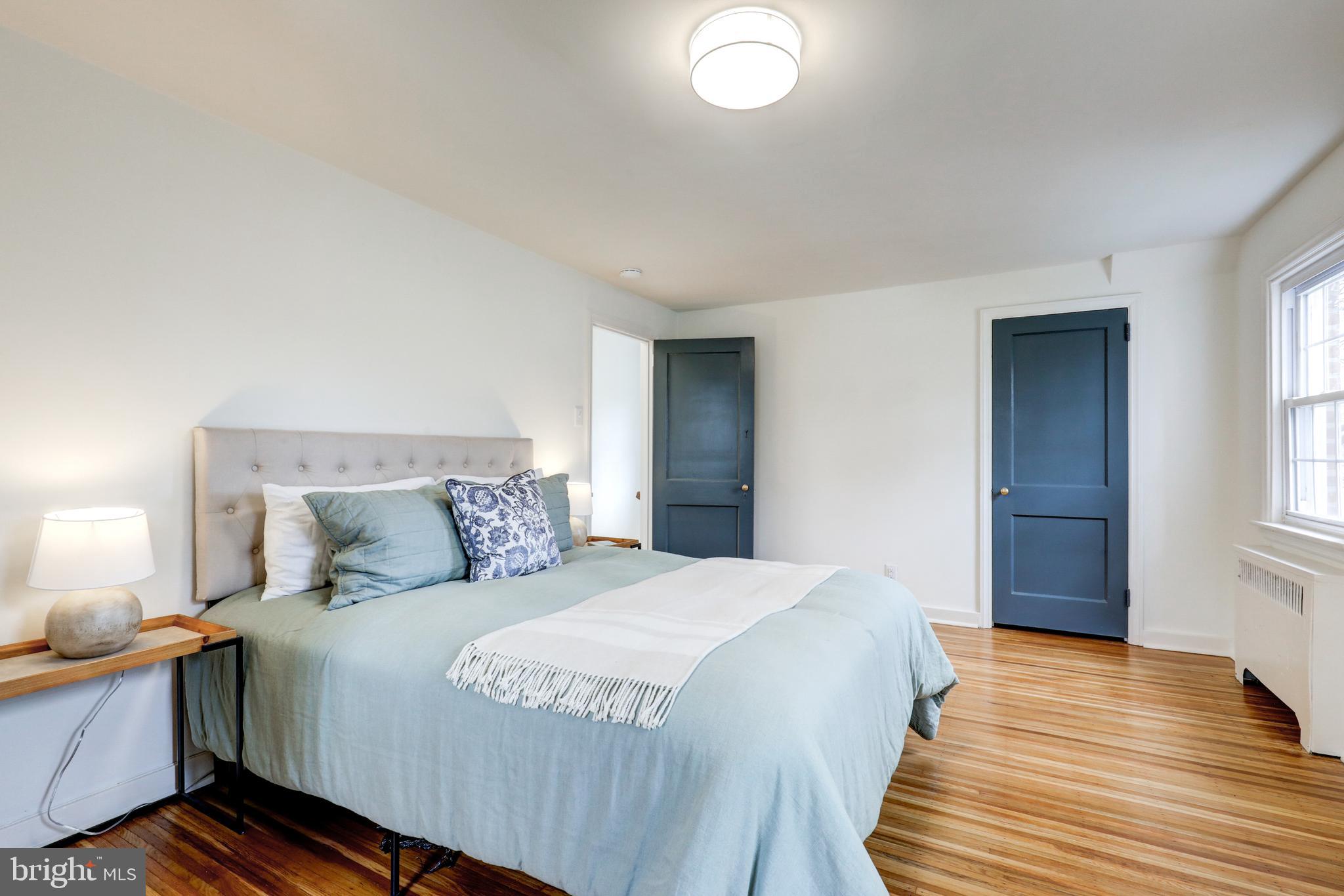 2316 Franklin Avenue Secane, PA 19018 - Photo 15 of 30 a bedroom with a bed and wooden floor