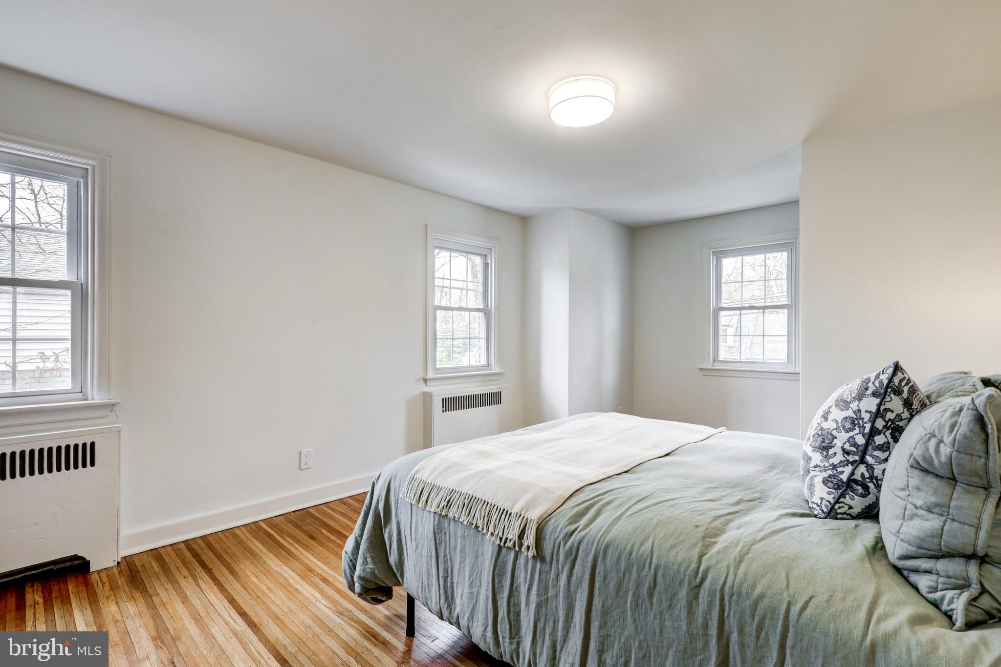 2316 Franklin Avenue Secane, PA 19018 - Photo 16 of 30 a bedroom with a bed and a window