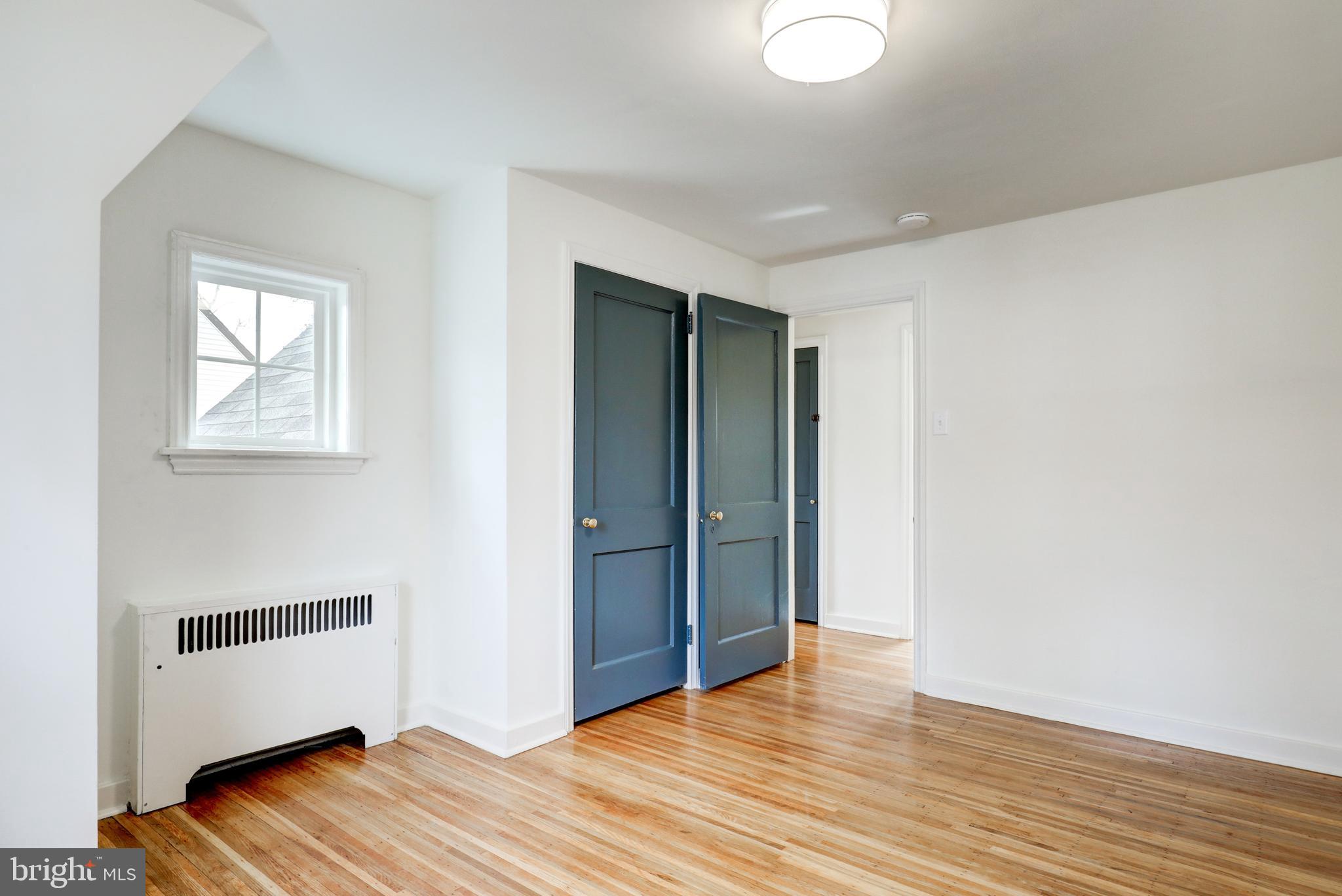 2316 Franklin Avenue Secane, PA 19018 - Photo 21 of 30 an empty room with wooden floor and windows