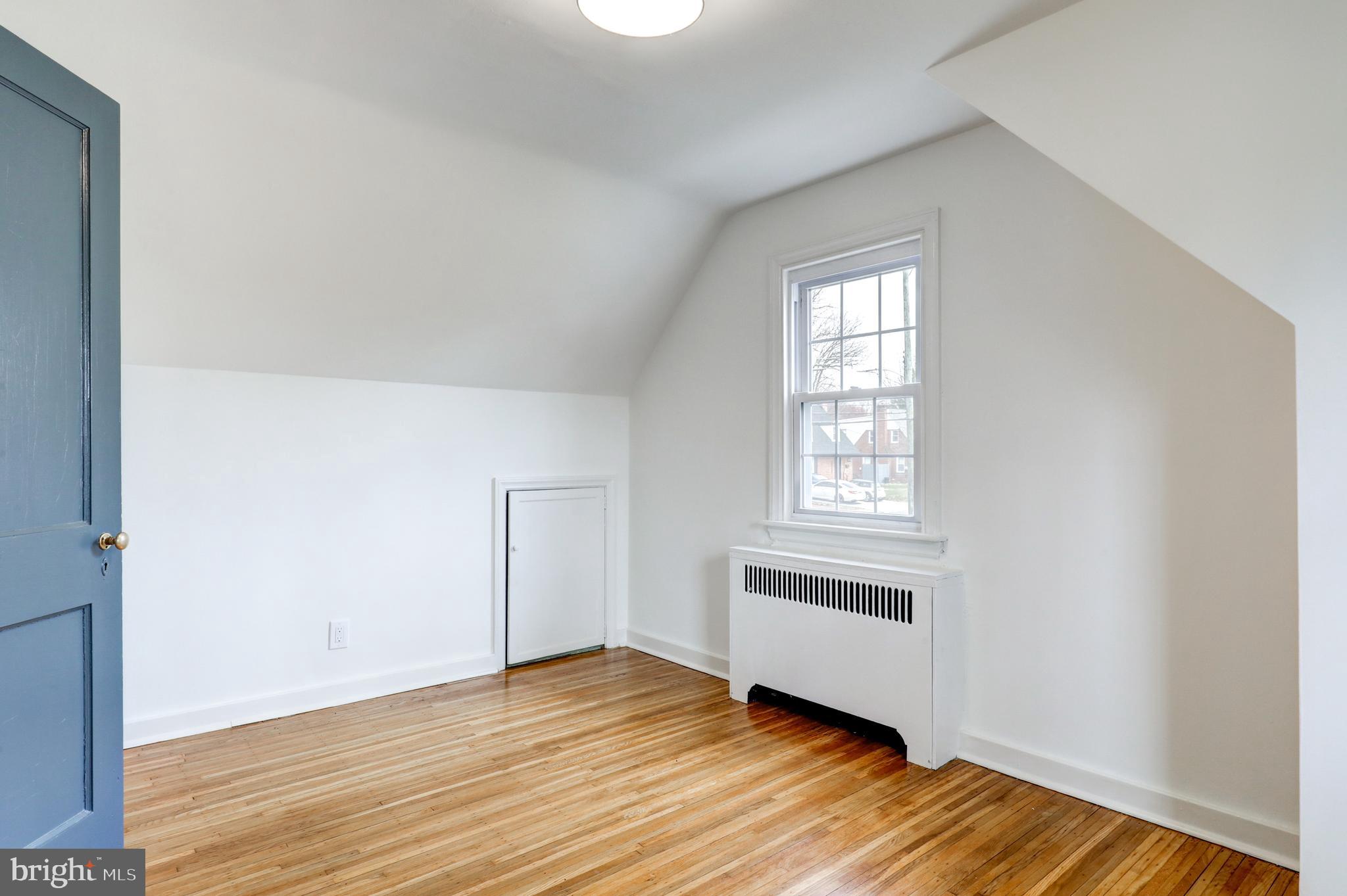 2316 Franklin Avenue Secane, PA 19018 - Photo 22 of 30 an empty room with wooden floor and windows