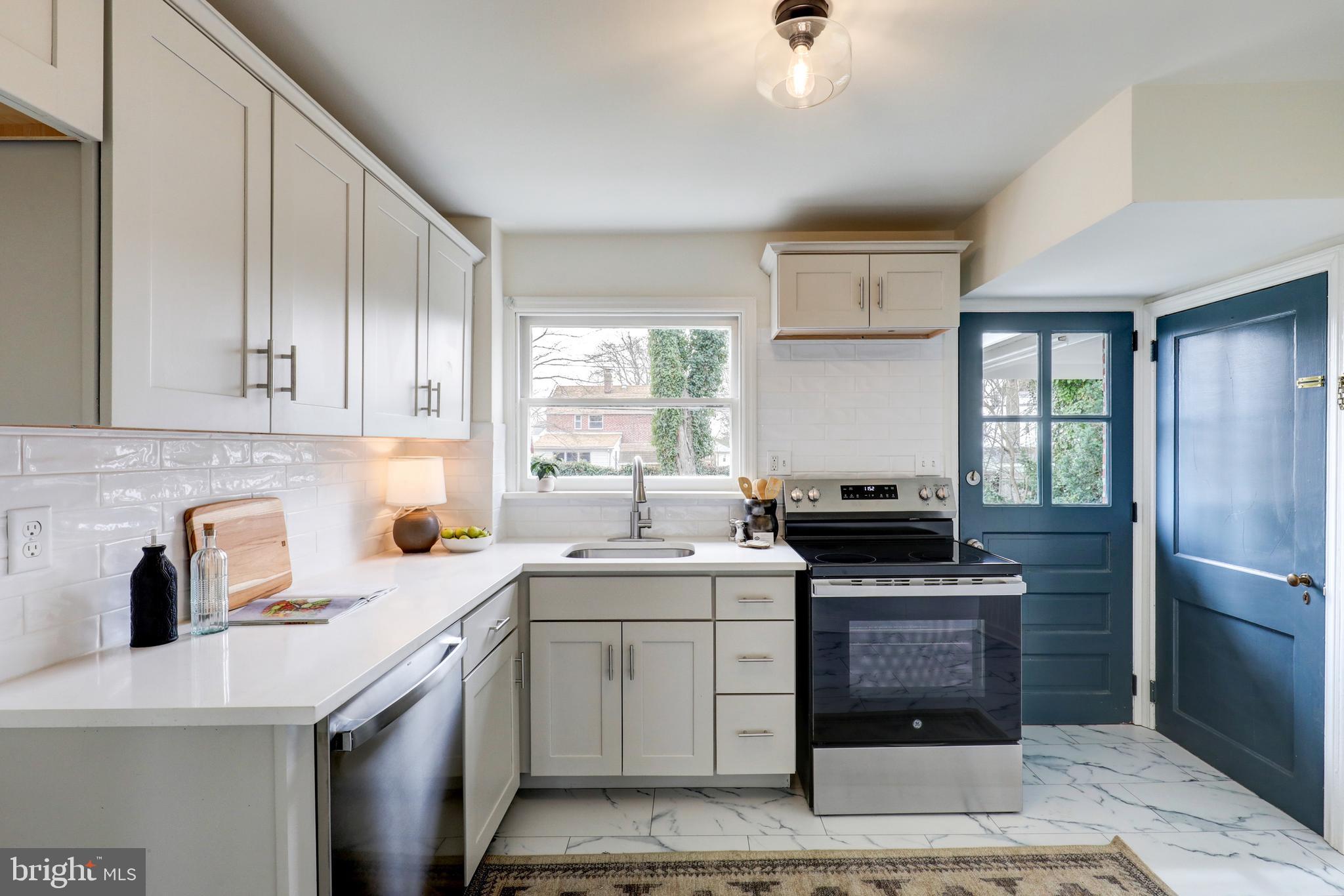 2316 Franklin Avenue Secane, PA 19018 - Photo 9 of 30 a kitchen with a sink appliances and cabinets