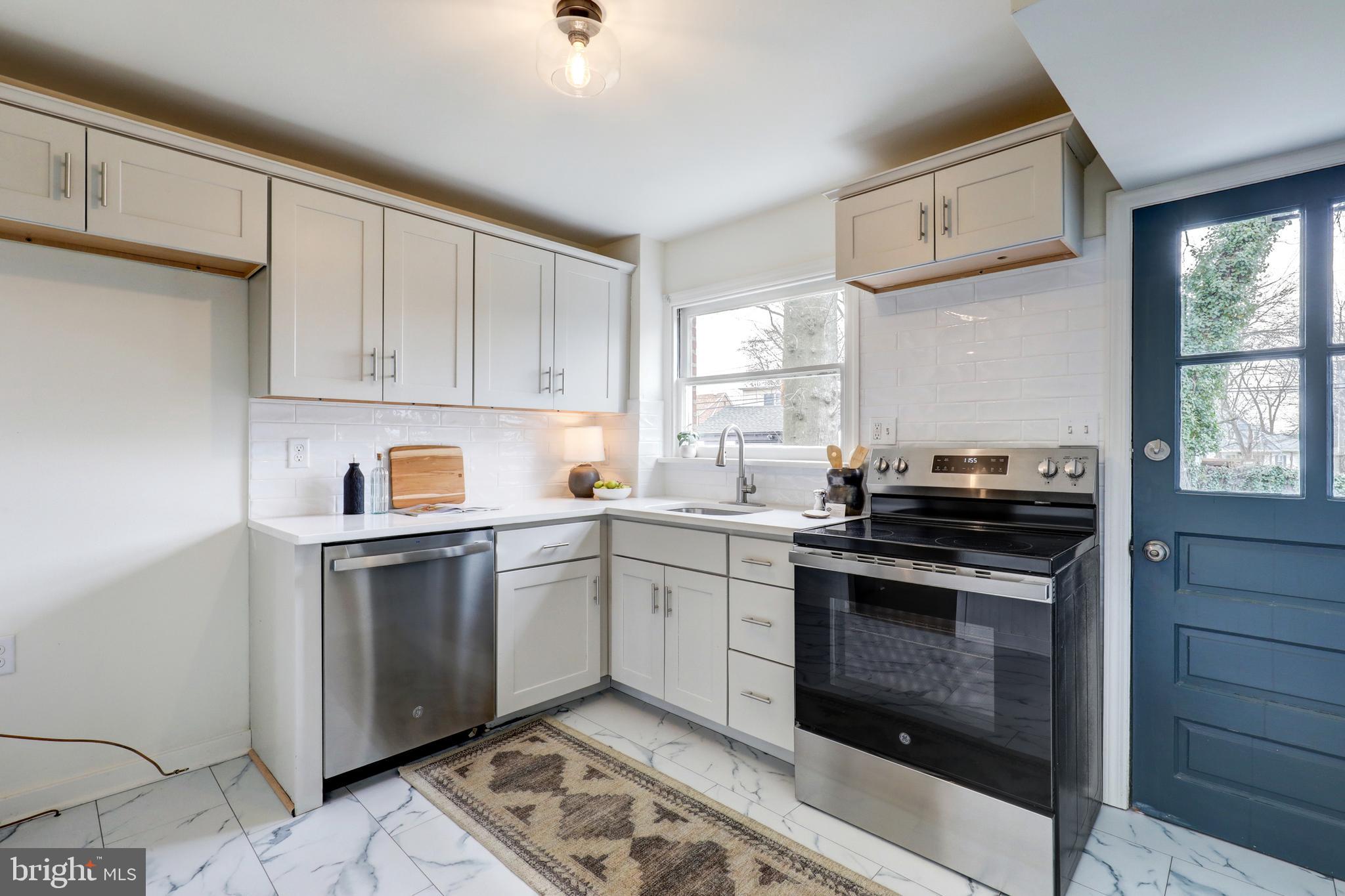 2316 Franklin Avenue Secane, PA 19018 - Photo 10 of 30 a kitchen with a stove and a sink