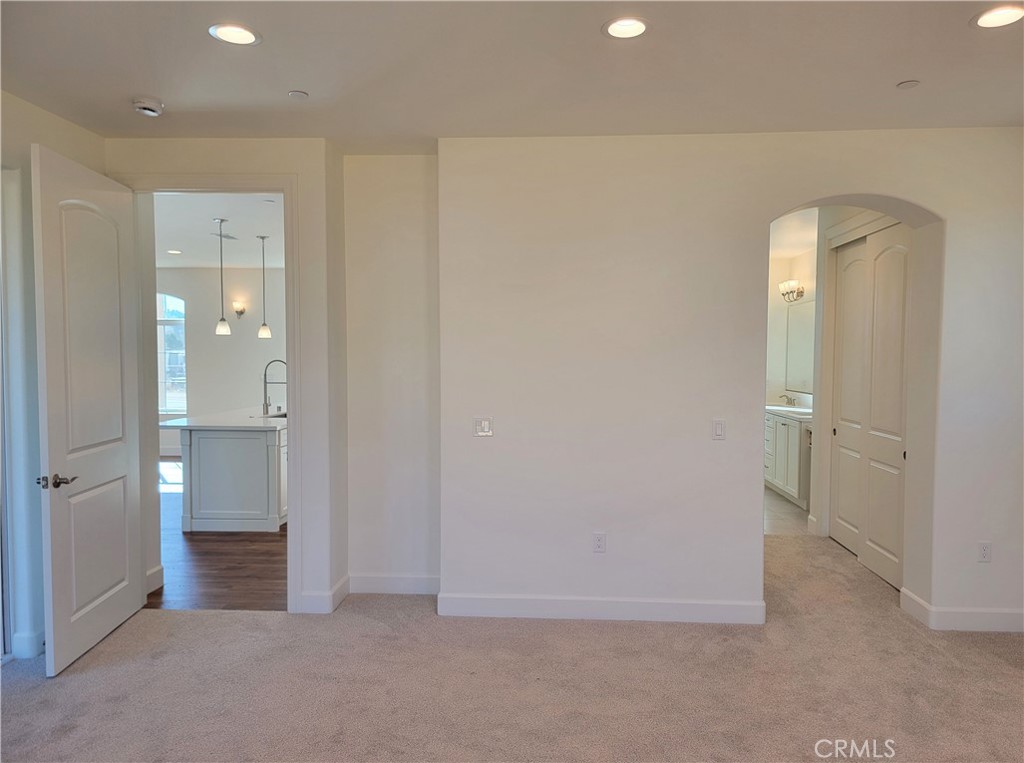 701 Manor Lane Paso Robles, CA 93446 - Photo 10 of 22 wooden floor and a bathroom with a sink