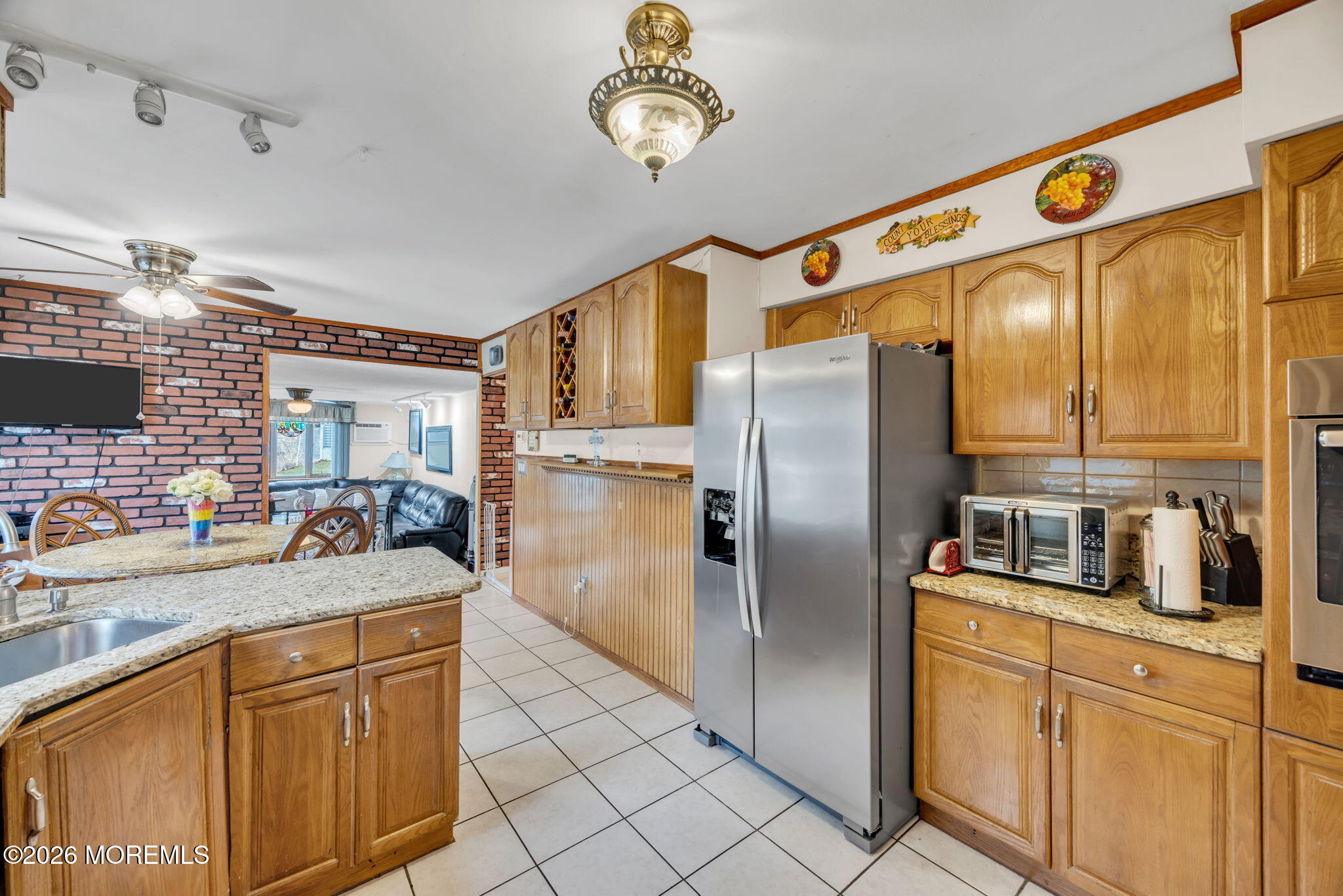 12 Avon Way Parlin, NJ 08859 - Photo 11 of 29 a kitchen with stainless steel appliances granite countertop a refrigerator a sink and dishwasher