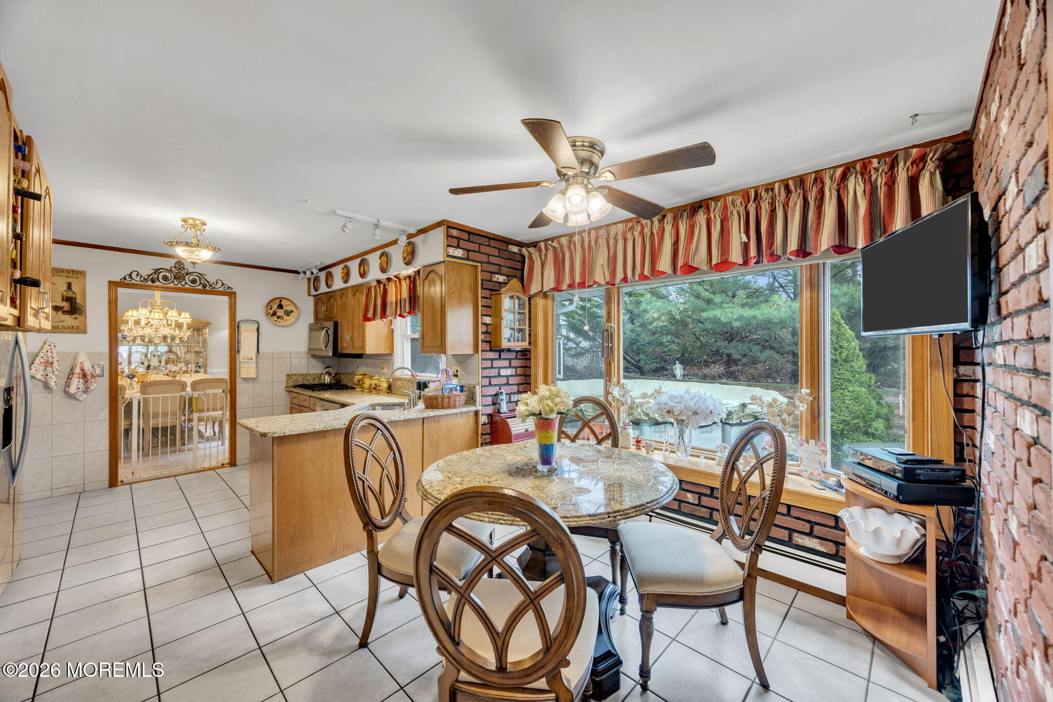 12 Avon Way Parlin, NJ 08859 - Photo 13 of 29 a view of a dining room with furniture window and outside view