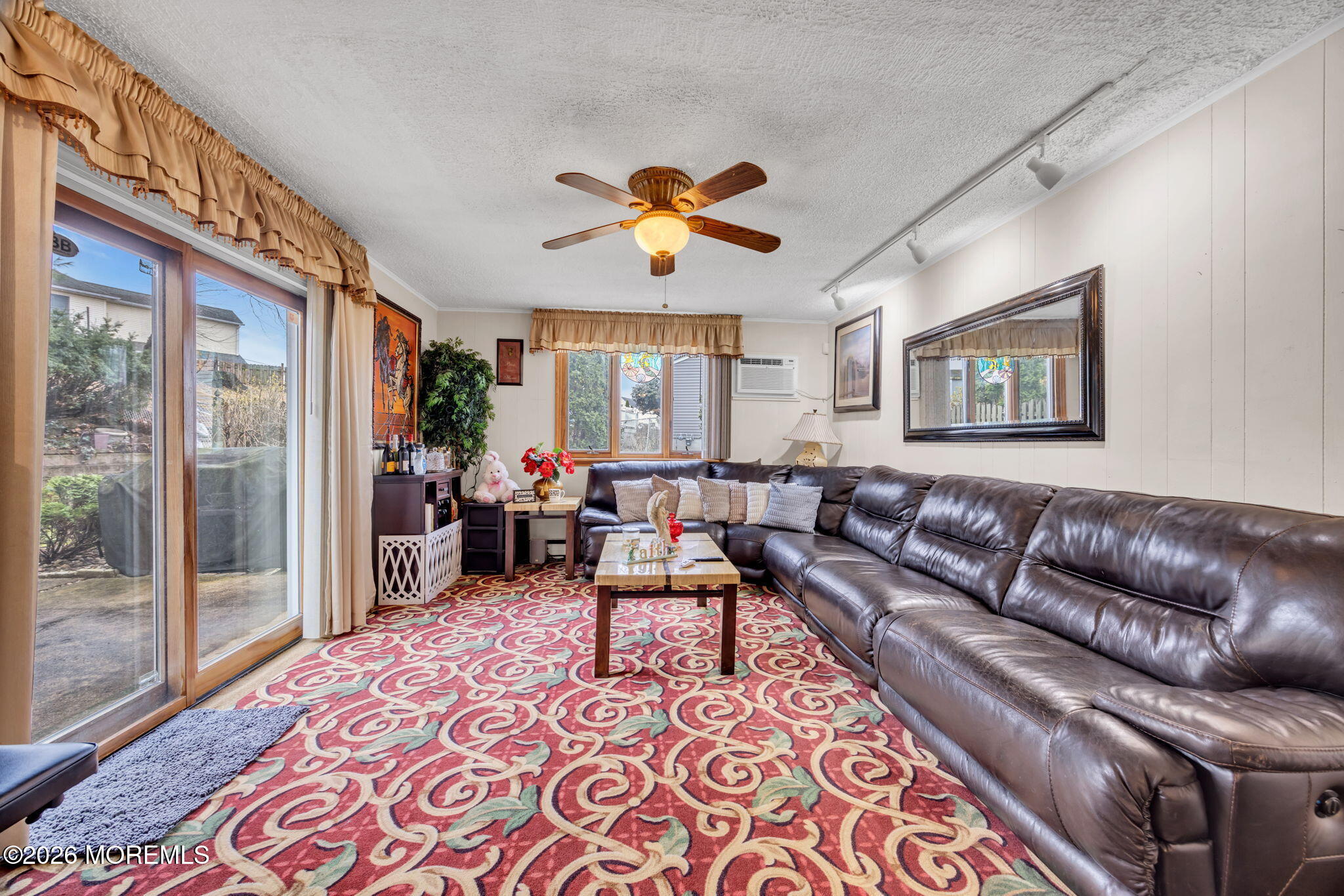 12 Avon Way Parlin, NJ 08859 - Photo 15 of 29 a living room with furniture and a large window