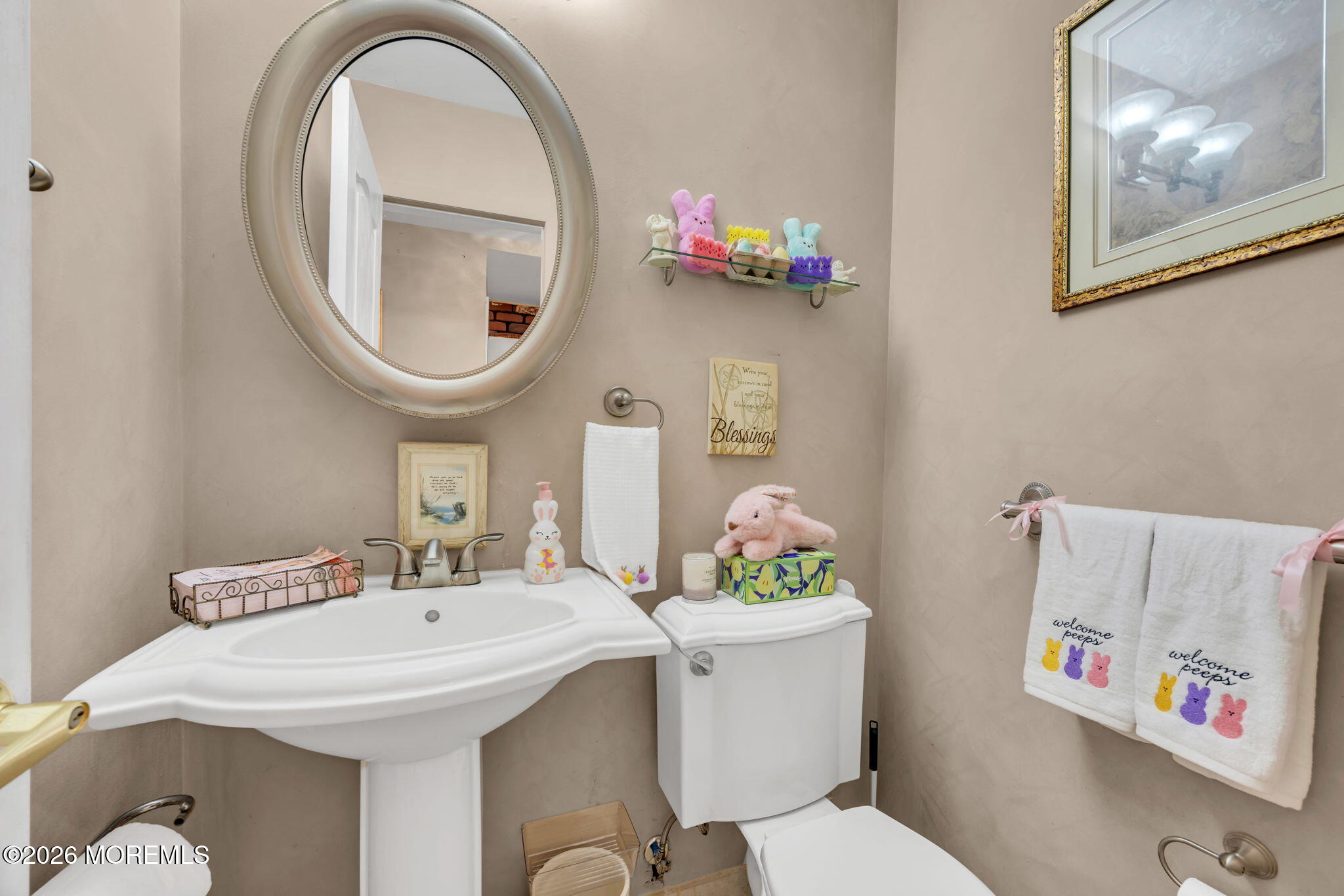 12 Avon Way Parlin, NJ 08859 - Photo 16 of 29 a bathroom with a toilet sink and mirror