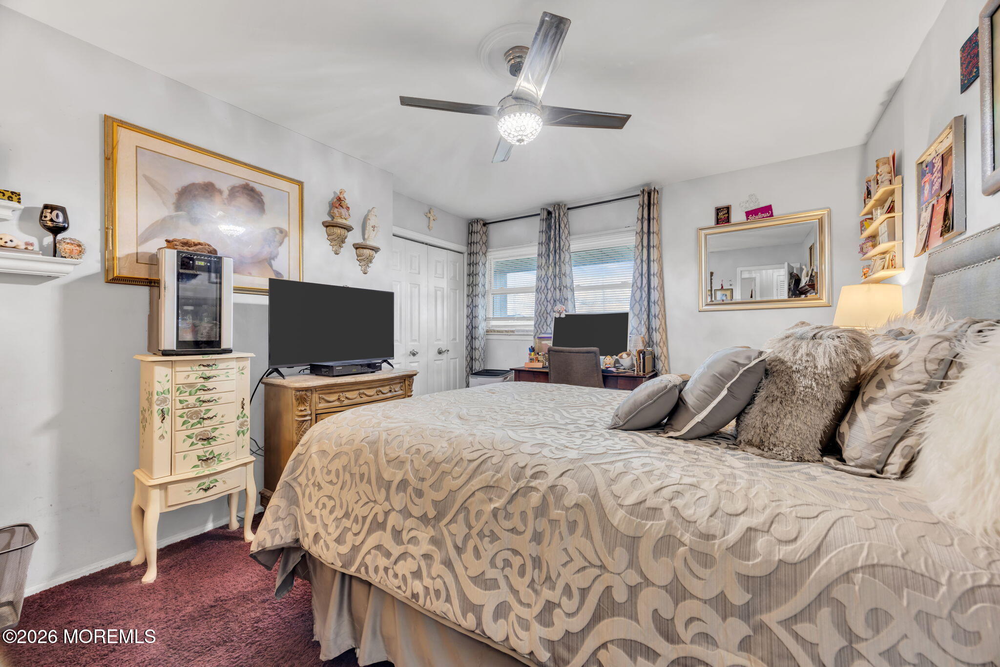 12 Avon Way Parlin, NJ 08859 - Photo 18 of 29 a bedroom with a bed and a flat screen tv