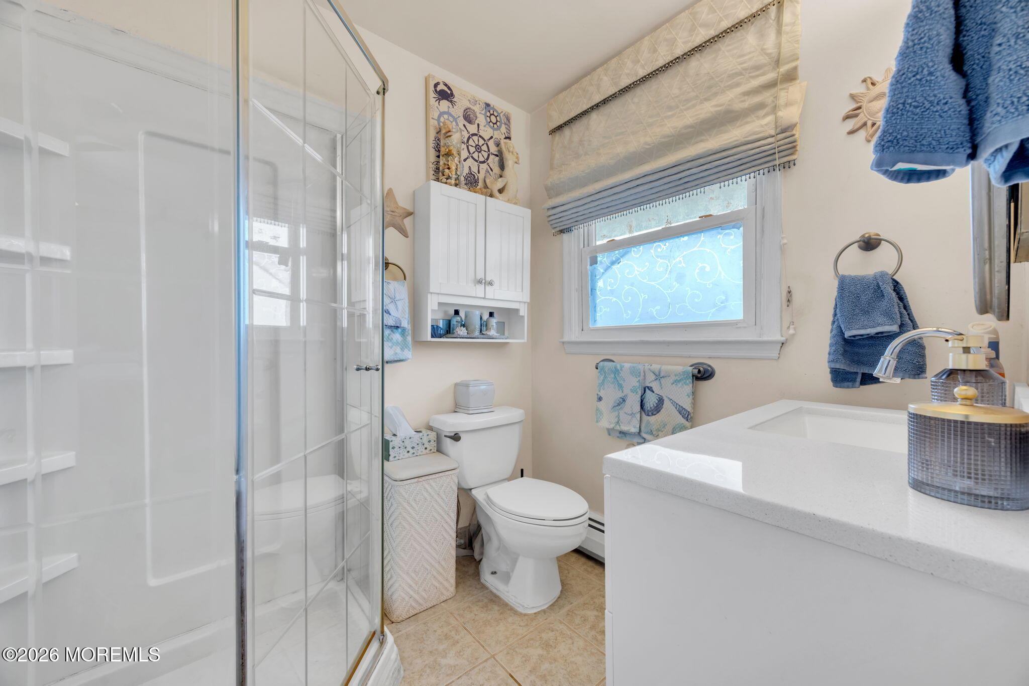 12 Avon Way Parlin, NJ 08859 - Photo 23 of 29 a bathroom with a sink toilet tub and shower