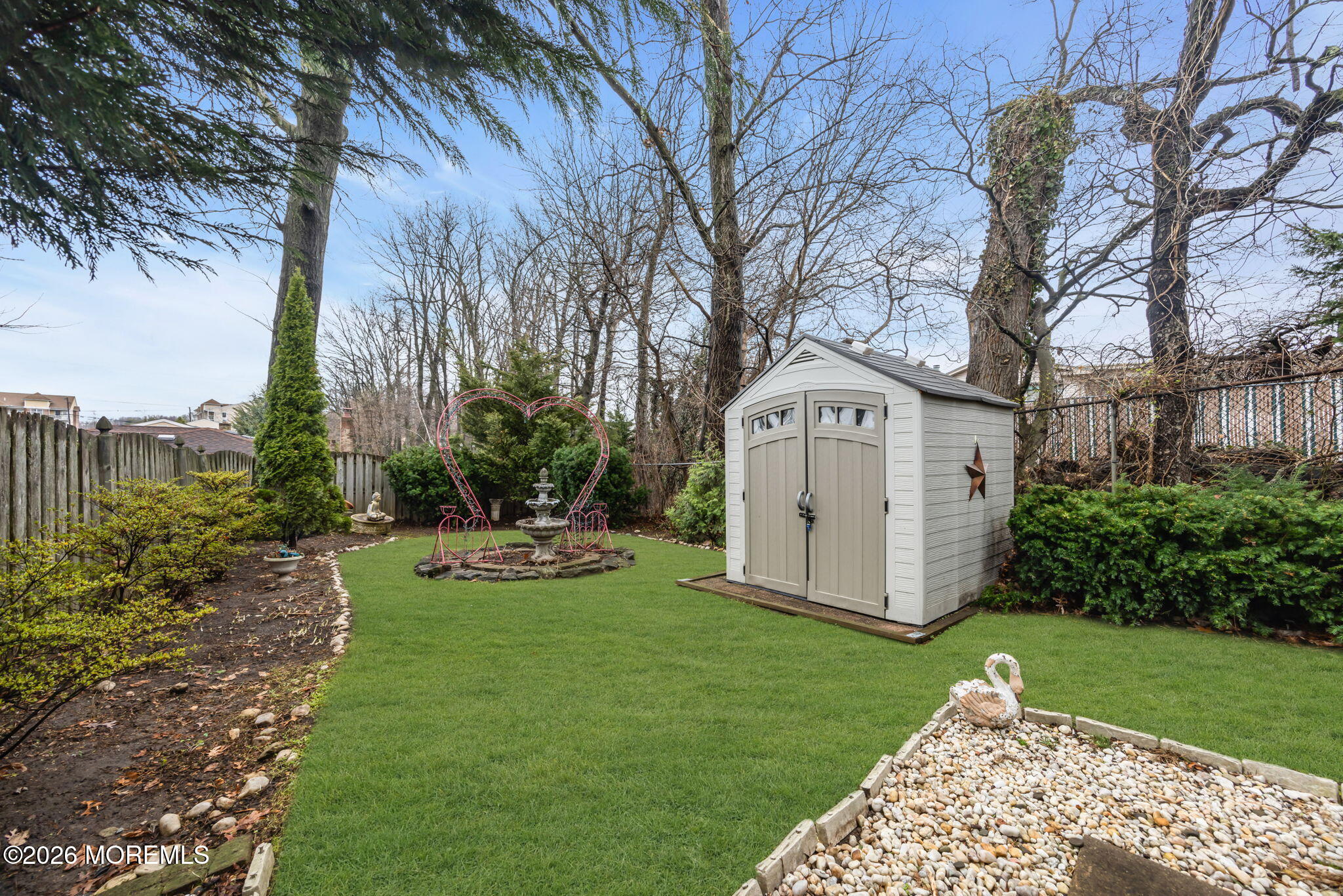 12 Avon Way Parlin, NJ 08859 - Photo 27 of 29 a view of an house with backyard space and garden