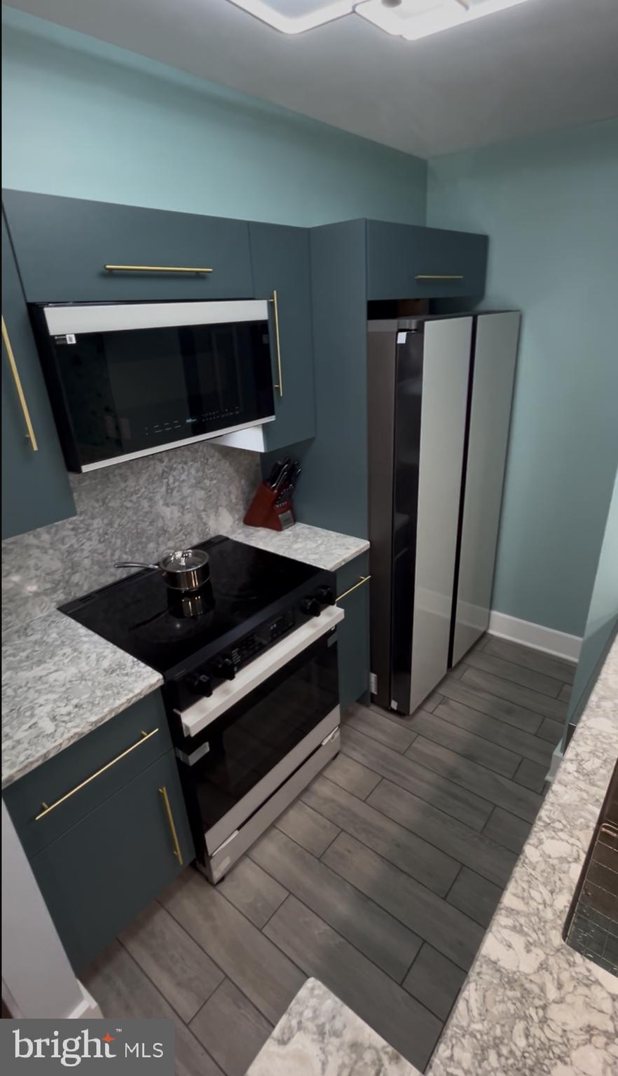 9712 Hellingly Place, Unit 209 Gaithersburg, MD 20886 - Photo 14 of 29 a outdoor space with wooden floor