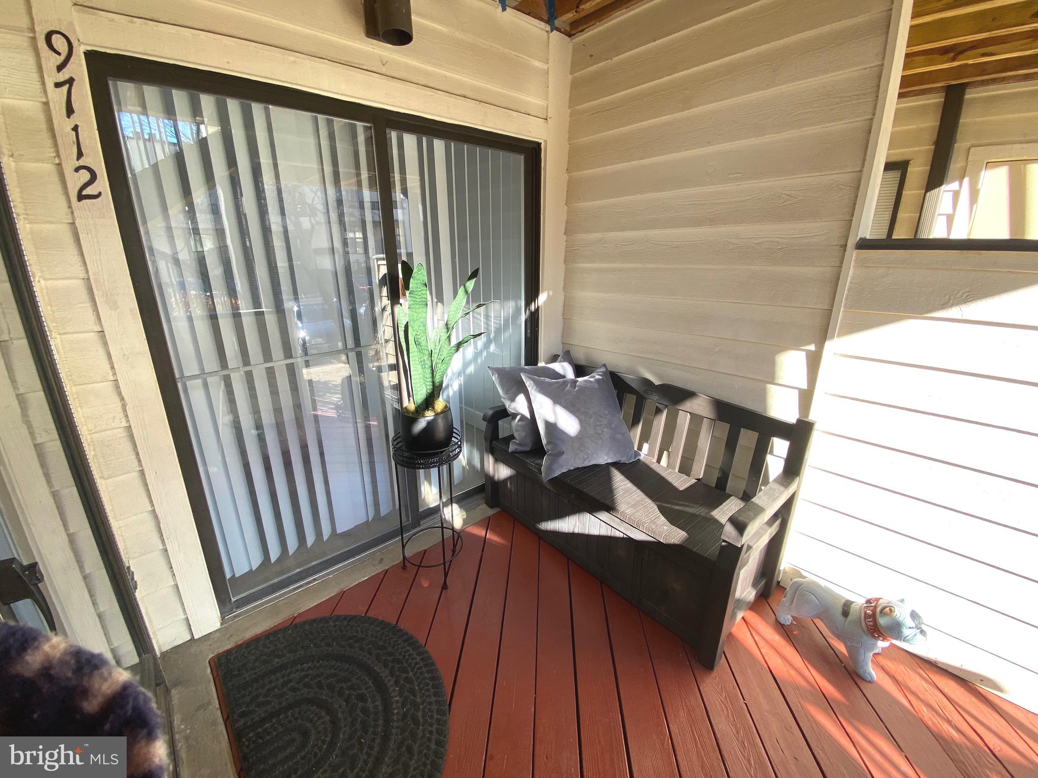 9712 Hellingly Place, Unit 209 Gaithersburg, MD 20886 - Photo 2 of 29 a view of deck with patio