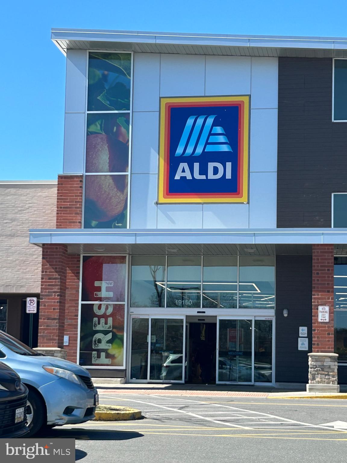 9712 Hellingly Place, Unit 209 Gaithersburg, MD 20886 - Photo 26 of 29 a view of a brick building with a window
