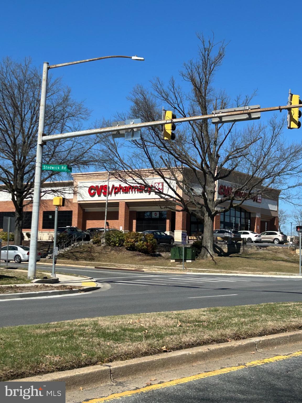 9712 Hellingly Place, Unit 209 Gaithersburg, MD 20886 - Photo 27 of 29 a view of a building and a street