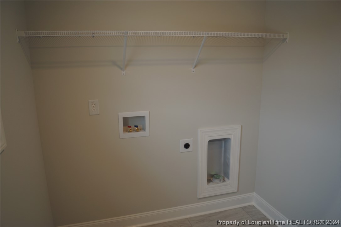 103 Grinnel Loop Sanford, NC 27332 - Photo 29 of 39 a bathroom with a window
