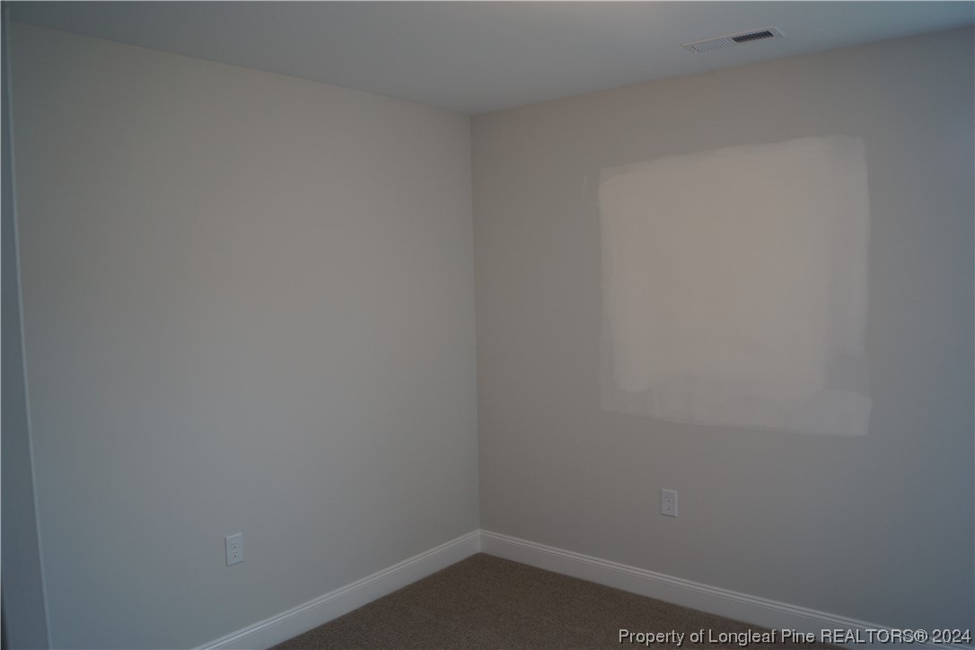 103 Grinnel Loop Sanford, NC 27332 - Photo 33 of 39 a room that has a window