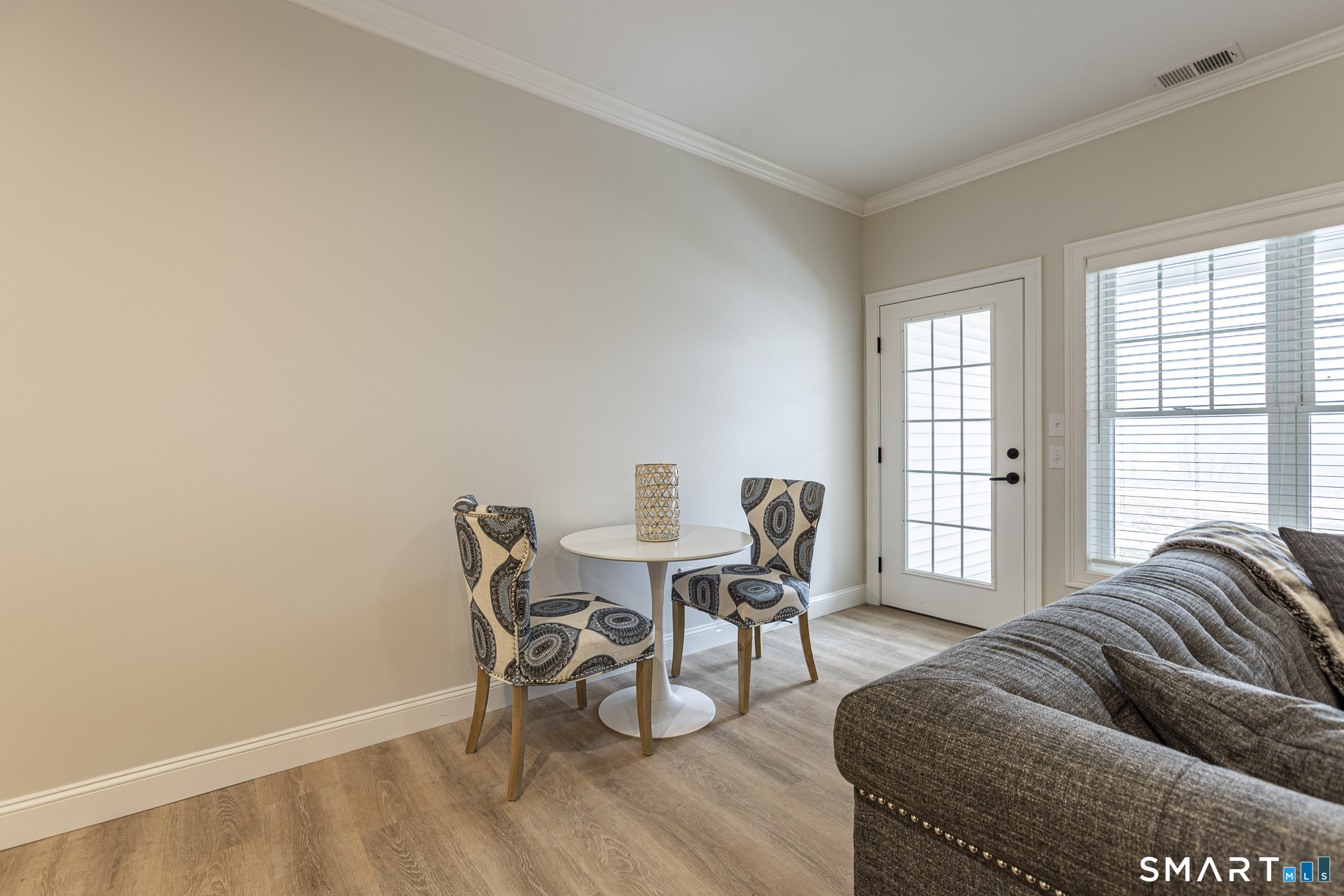 7 Loomis Road, Unit C Bolton, CT 06043 - Photo 11 of 26 a living room with furniture and a window