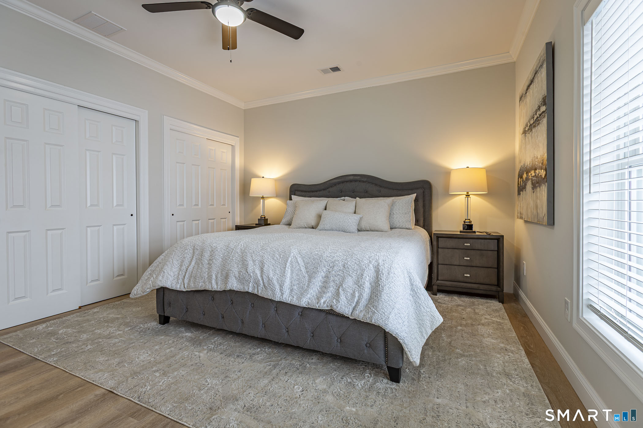 7 Loomis Road, Unit C Bolton, CT 06043 - Photo 13 of 26 a spacious bedroom with a bed and a window