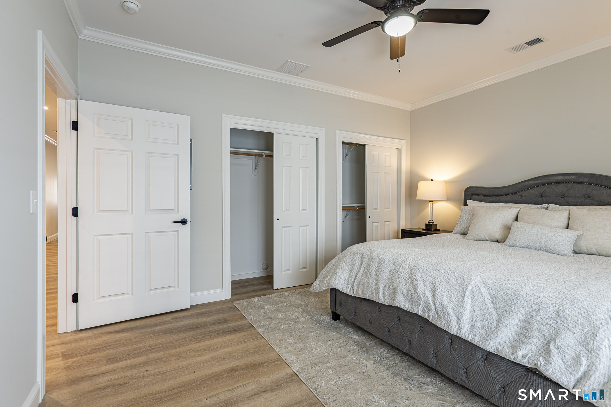 7 Loomis Road, Unit C Bolton, CT 06043 - Photo 14 of 26 a bedroom with a bed and a ceiling fan