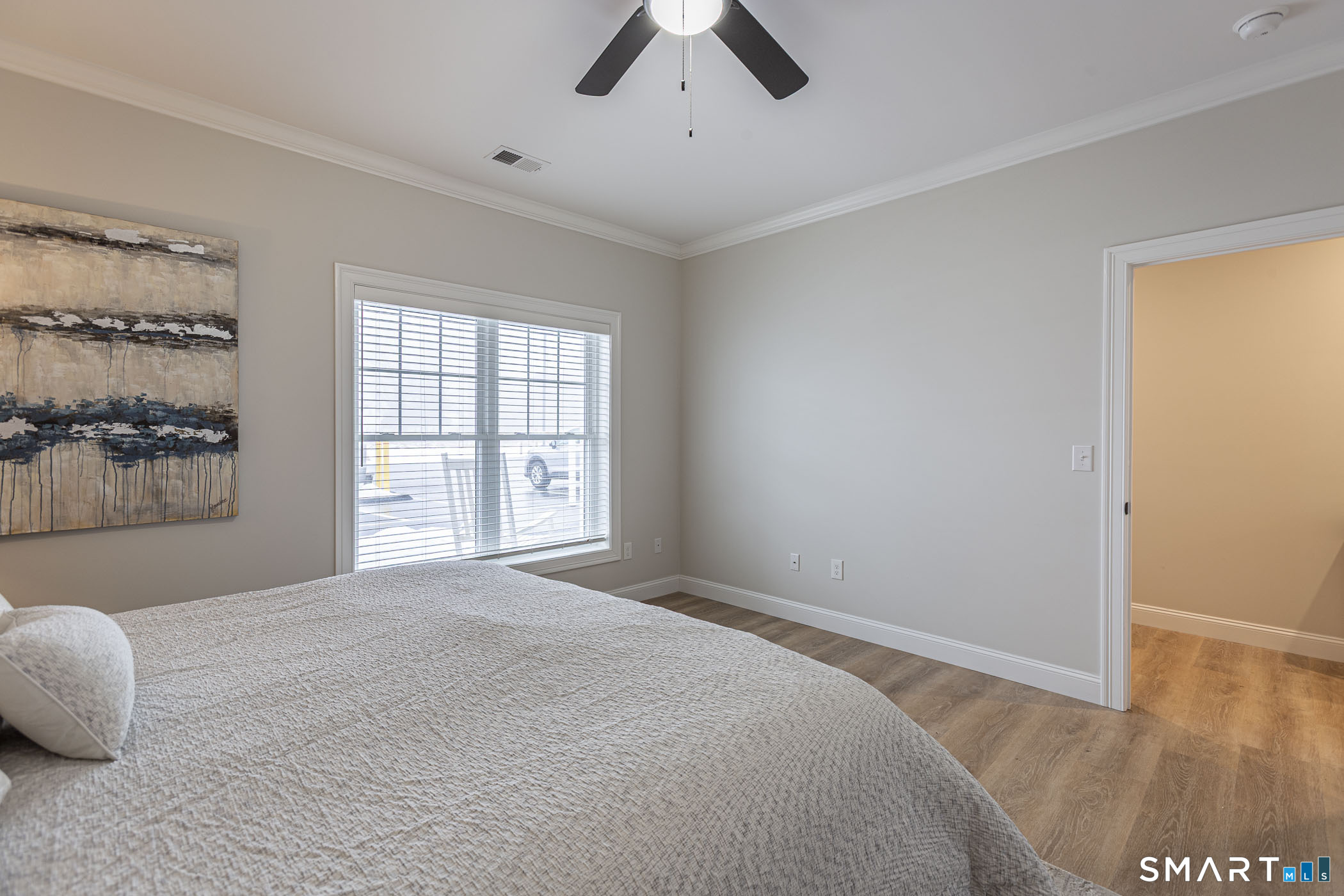 7 Loomis Road, Unit C Bolton, CT 06043 - Photo 15 of 26 a bedroom with a bed and window