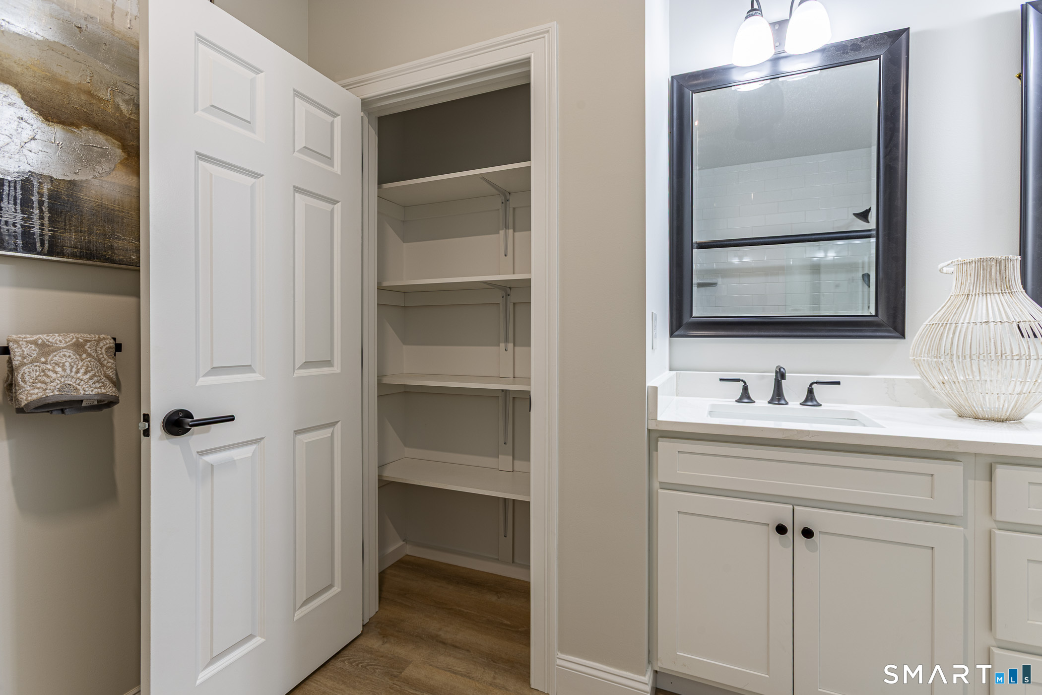 7 Loomis Road, Unit C Bolton, CT 06043 - Photo 19 of 26 a bathroom with a sink and mirror