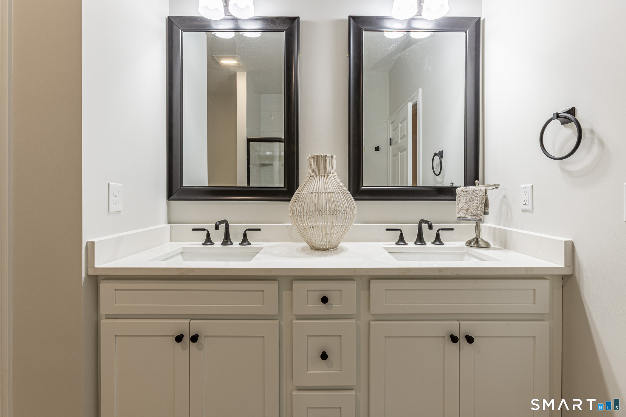 7 Loomis Road, Unit C Bolton, CT 06043 - Photo 20 of 26 a bathroom with double sink and a mirror
