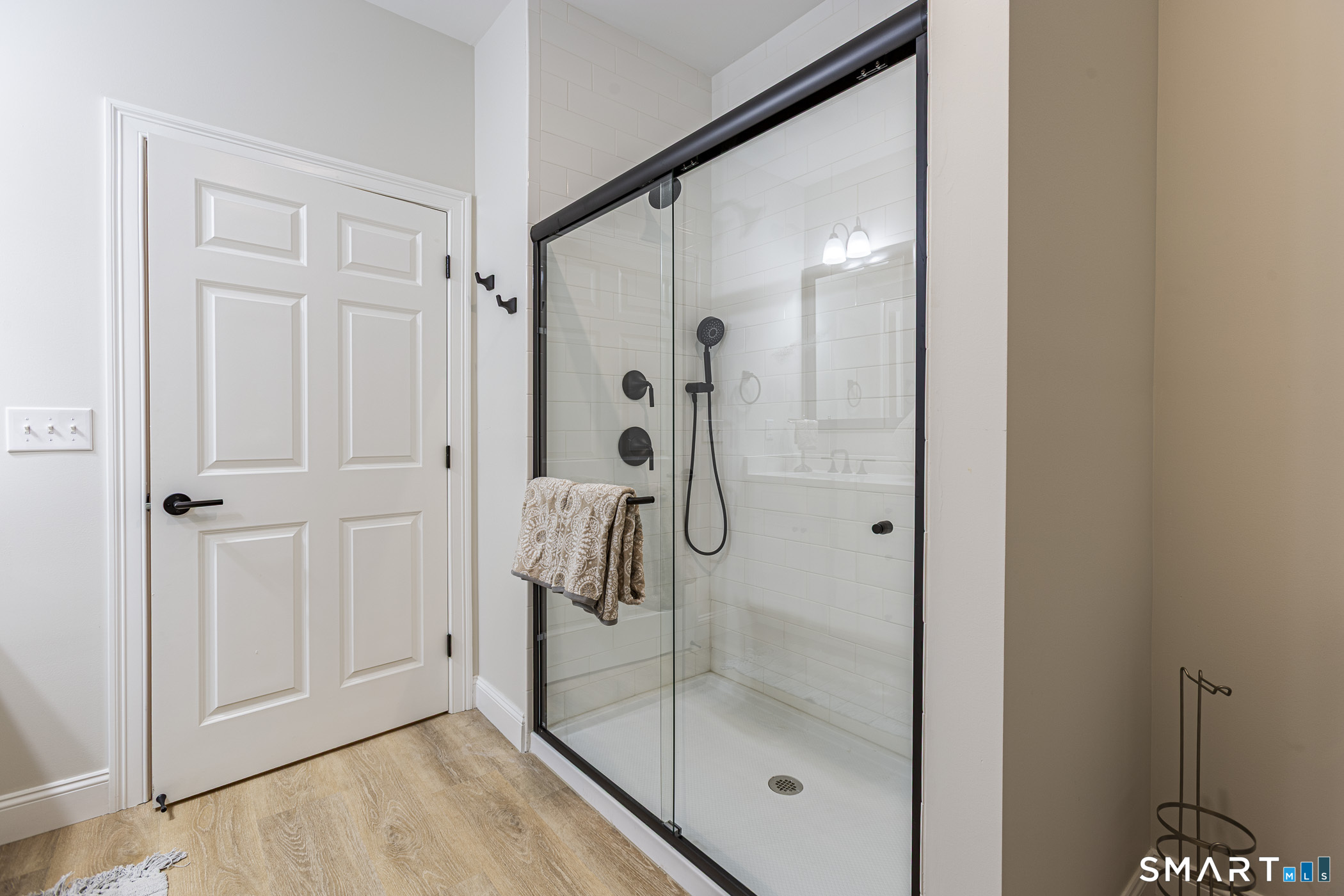 7 Loomis Road, Unit C Bolton, CT 06043 - Photo 21 of 26 a bathroom with a glass shower door