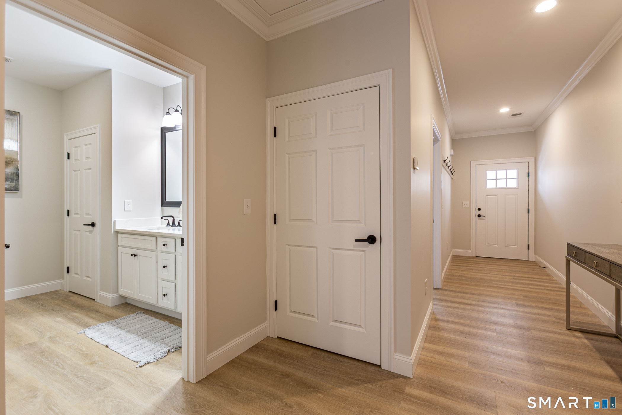 7 Loomis Road, Unit C Bolton, CT 06043 - Photo 22 of 26 wooden floor with white walls