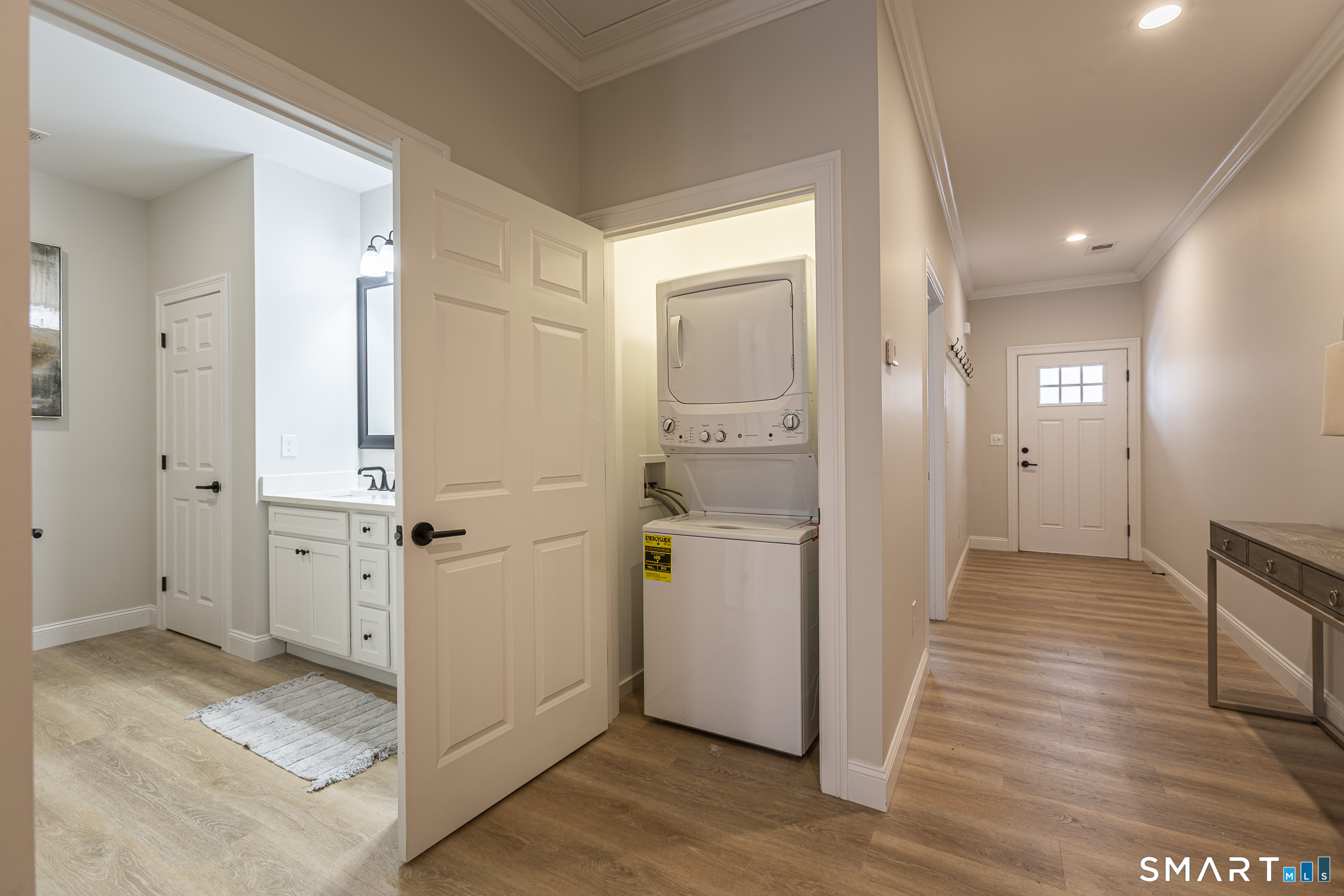 7 Loomis Road, Unit C Bolton, CT 06043 - Photo 24 of 26 a view of a hallway with wooden floor