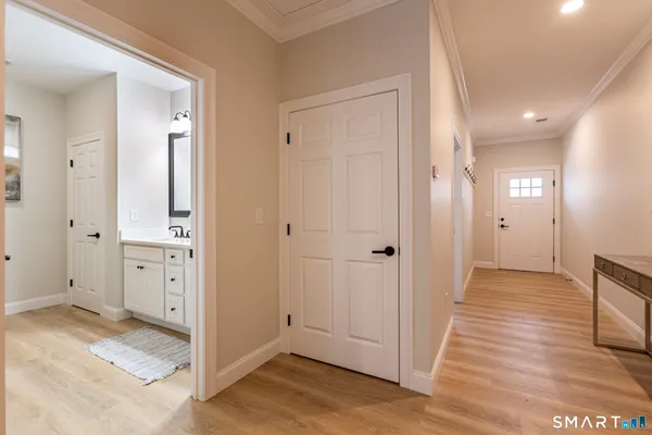 wooden floor with white walls