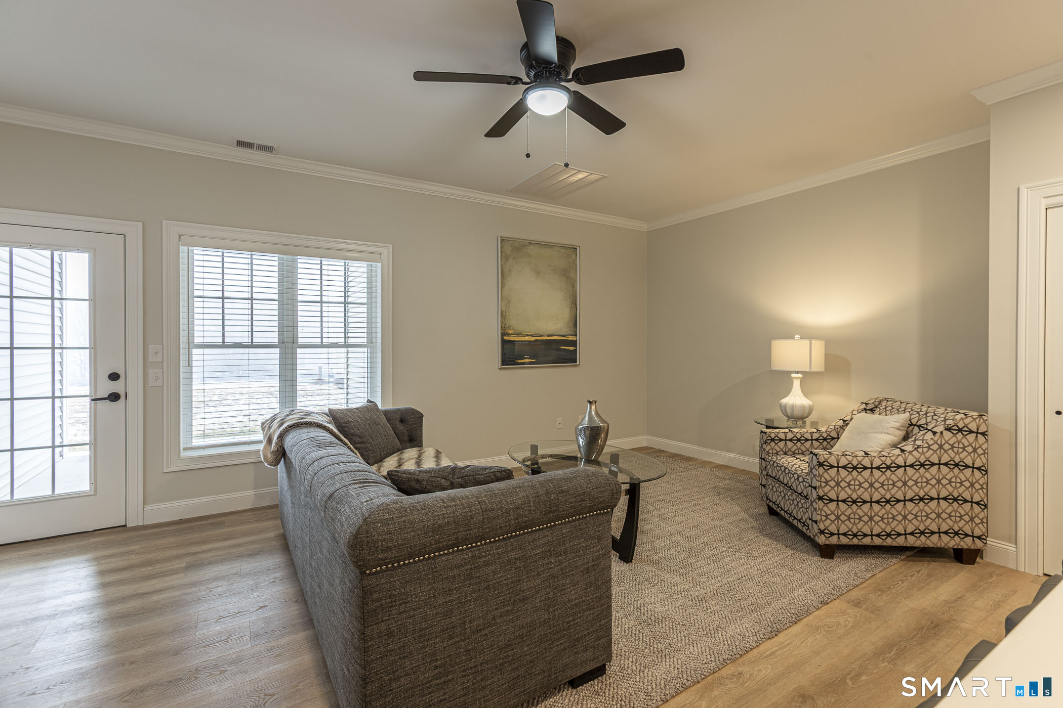 7 Loomis Road, Unit C Bolton, CT 06043 - Photo 9 of 26 a living room with furniture and a window