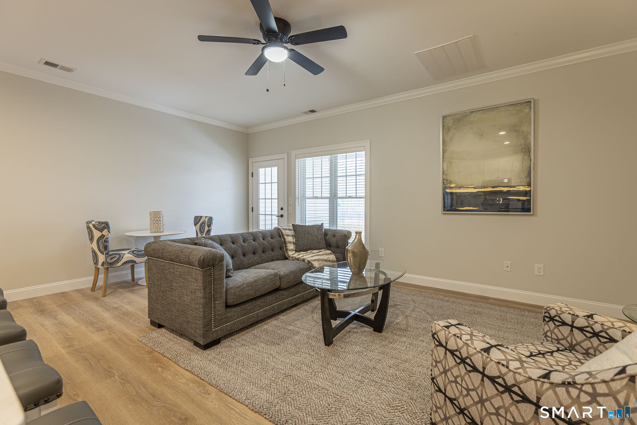 7 Loomis Road, Unit C Bolton, CT 06043 - Photo 10 of 26 a living room with furniture and a window