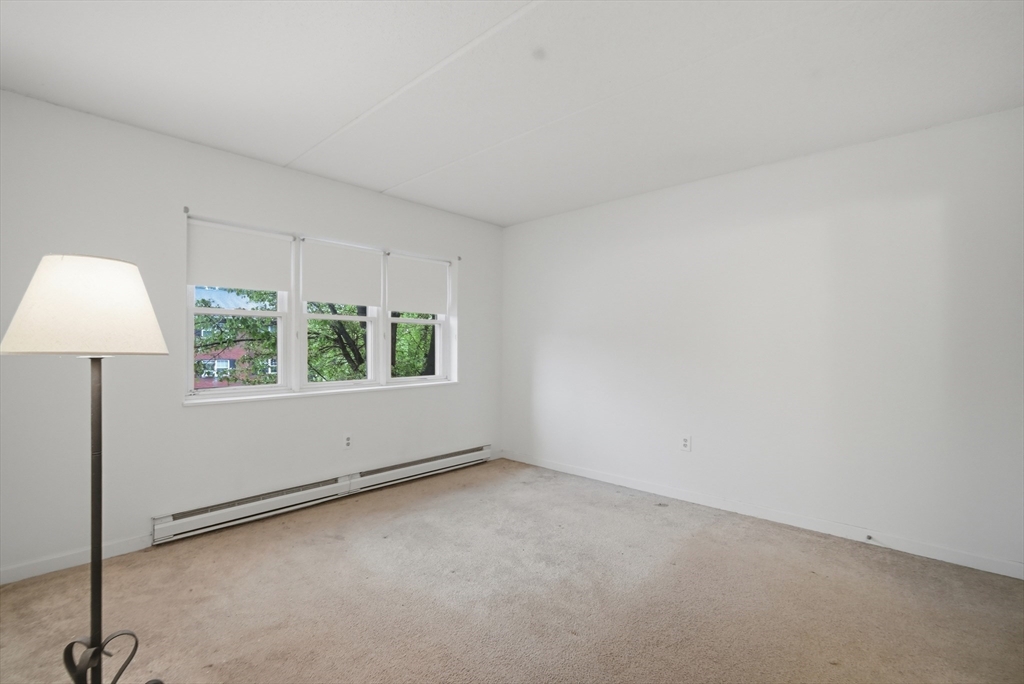 36 Maple Crest Circle, Unit F Holyoke, MA 01040 - Photo 12 of 16 an empty room with a window