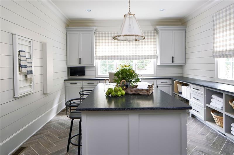 10210 Cedar Ridge Drive Milton, GA 30004 - Photo 9 of 17 a kitchen with stainless steel appliances a sink a potted plant and a window